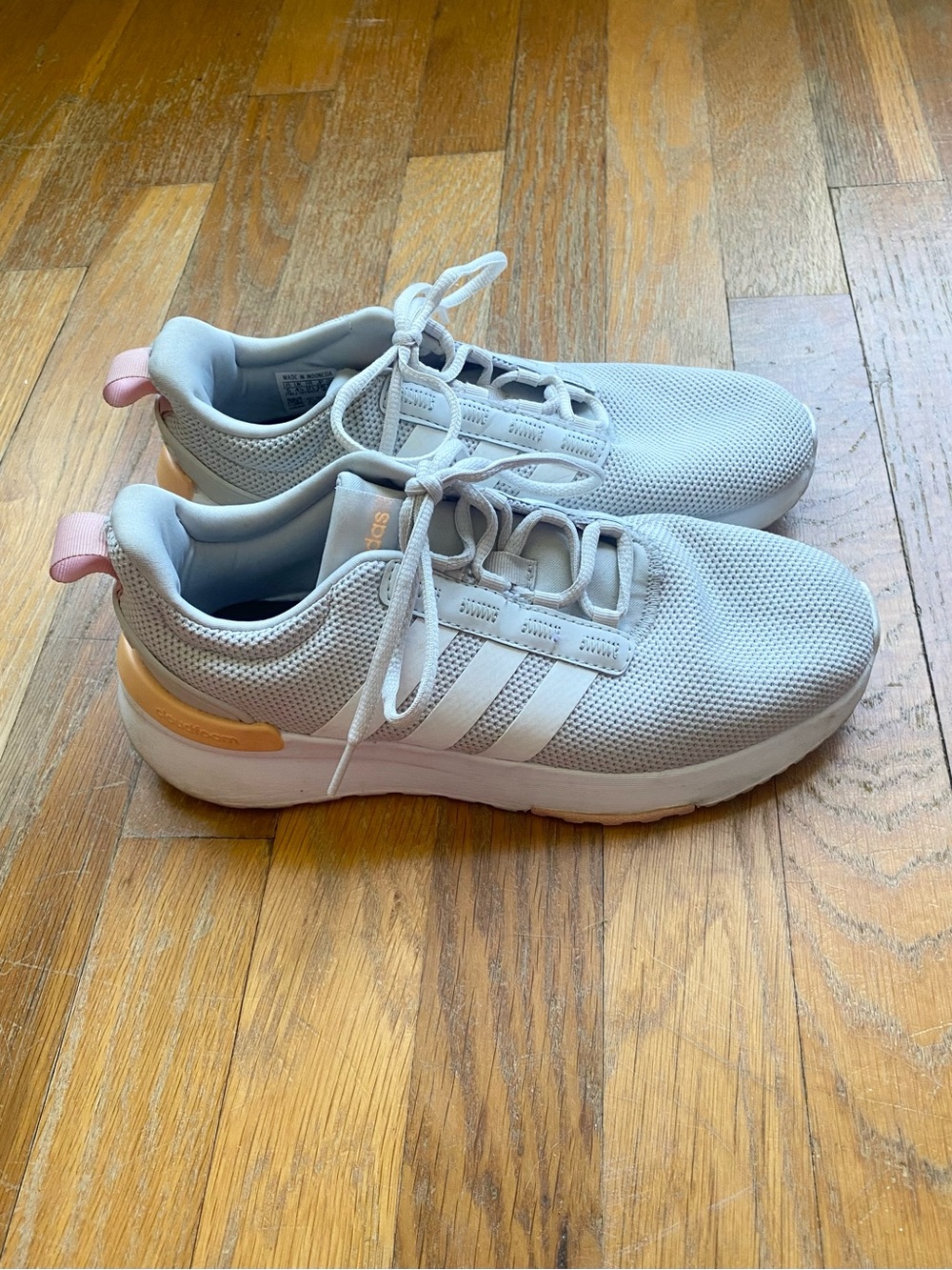 Women’s adidas white and peach Mesh tennis shoes